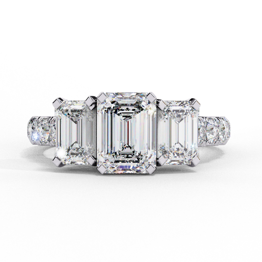 White gold ring with three emerald diamonds
Three emerald cut stones in white gold
Classic three stone emerald ring
White gold band with emerald cut diamonds
Three emerald cuts on a white gold band
Elegant three stone emerald cut ring
White gold ring with three emerald stones
Three emerald cut diamonds in white gold
Simple white gold ring with emerald cuts
Three stone emerald ring in white gold