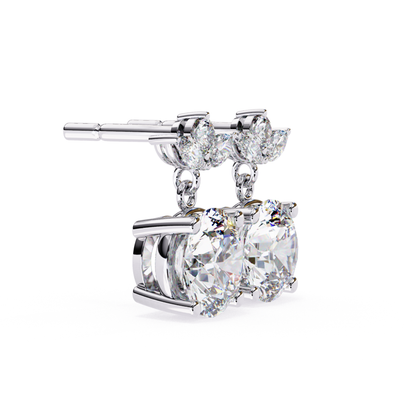  Refined double diamond earrings with floral details in white gold, adorned with pear-shaped diamonds.