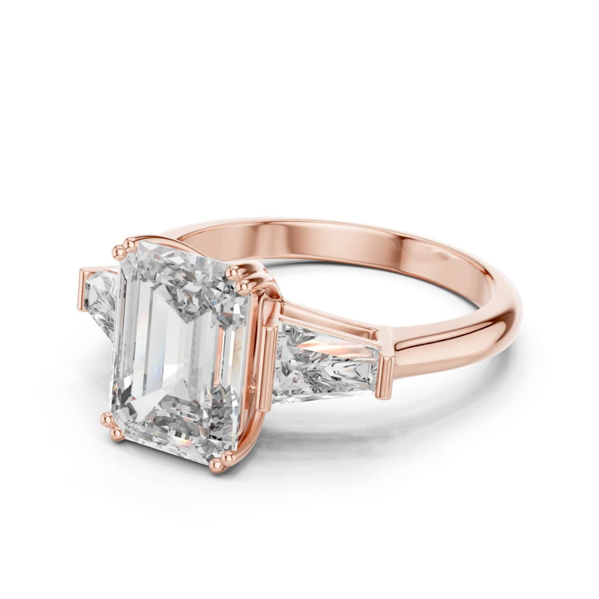 Angled view emerald cut diamond ring
Rose gold emerald cut baguette diamond ring
Emerald cut diamond with tapered baguette stones
Three stone emerald cut diamond ring
Four prong emerald cut diamond ring
Rose gold diamond ring angled profile
Emerald cut center stone with baguette sides
Classic emerald cut diamond ring in rose gold
Angled rose gold diamond ring design
Emerald cut three stone ring side angle