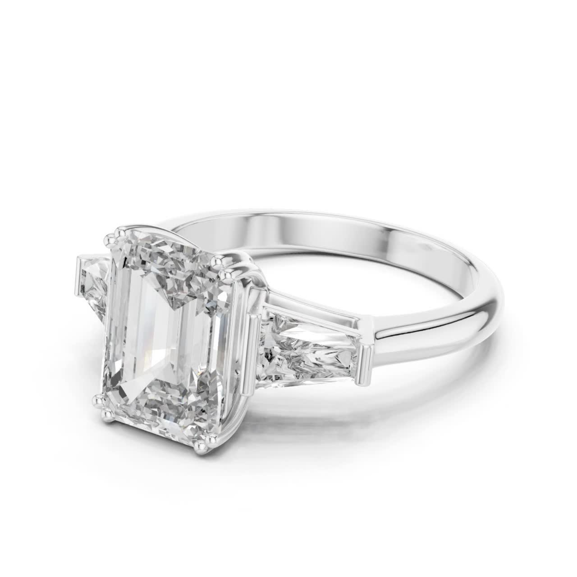 Angled view emerald cut diamond ring
White gold emerald cut baguette diamond ring
Emerald cut diamond with tapered baguette stones
Three stone emerald cut diamond ring
Four prong emerald cut diamond ring
White gold diamond ring angled profile
Emerald cut center stone with baguette sides
Classic emerald cut diamond ring in white gold
Angled white gold diamond ring design
Emerald cut three stone ring side angle