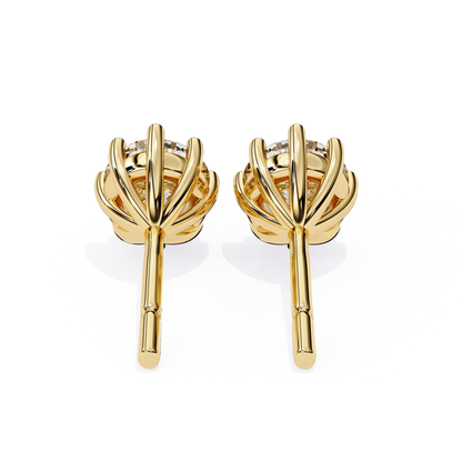Exquisite rose gold solitaire diamond studs, perfect for any occasion.