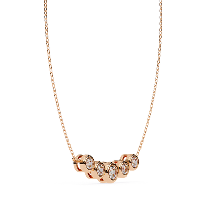 Rose gold necklace side view with round diamonds in bezel setting