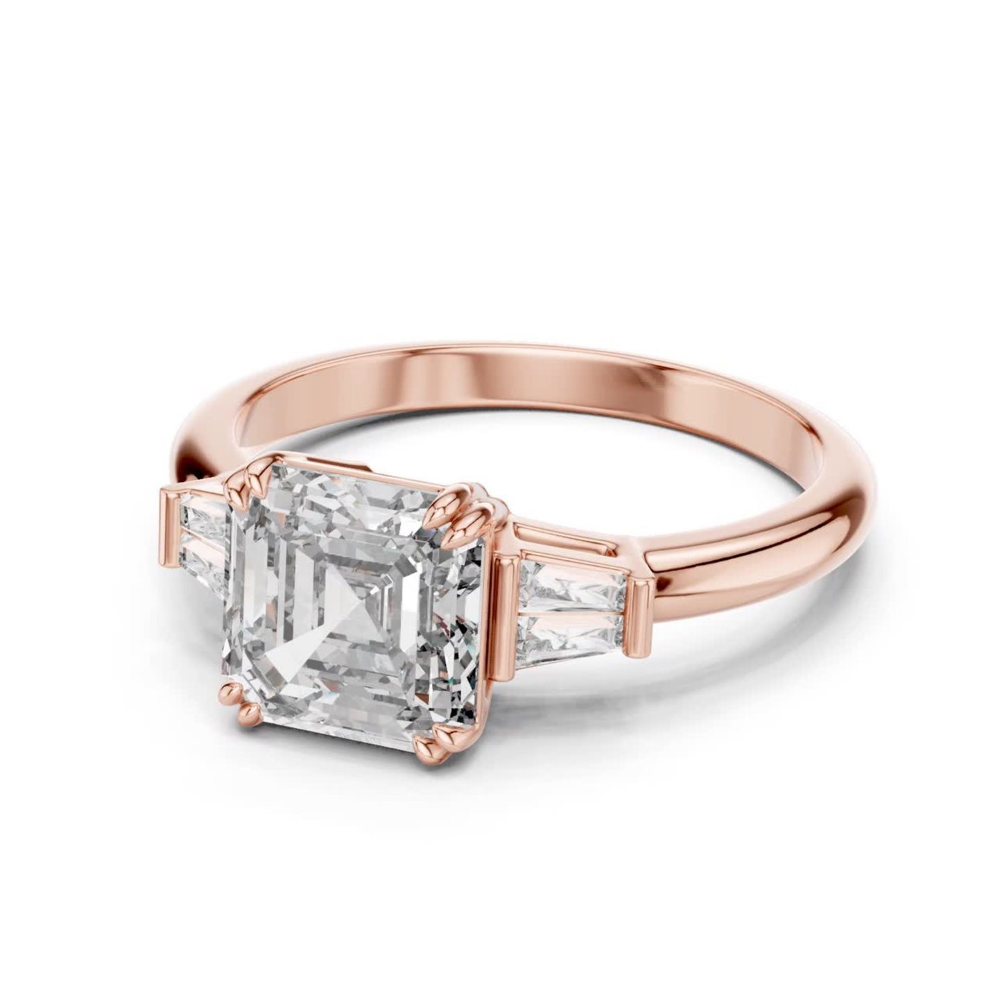 Rose gold Asscher cut diamond ring angled view
Asscher cut diamond ring with tapered side stones
Rose gold three stone diamond ring
Angled view of Asscher cut diamond ring
Rose gold ring with side accent diamonds
Asscher cut diamond ring with polished band
Lab grown Asscher diamond rose gold ring
Rose gold solitaire ring with side stones
Elegant Asscher cut diamond ring in rose gold
Rose gold Asscher diamond engagement ring