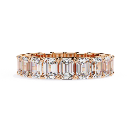 Rose gold eternity ring with emerald diamonds
Emerald diamonds in a rose gold eternity band
Rose gold band featuring emerald cut diamonds
Close up of a rose gold diamond eternity ring
Side view of a rose gold eternity ring
Rose gold band with continuous emerald diamonds
Top view of rose gold eternity band
Rose gold band with clear emerald diamonds
Elegant rose gold eternity ring with diamonds
Classic rose gold band with emerald cut diamonds