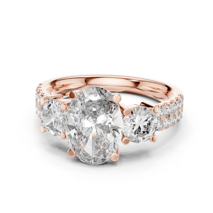 Rose gold oval three stone diamond engagement ring
Oval cut diamond ring with pave side stones
Rose gold oval diamond ring with accent diamonds
Three stone oval diamond bridal ring in rose gold
Oval lab diamond ring with round side stones
Rose gold prong set oval diamond ring design
Classic oval diamond engagement ring with pave band
Minimal rose gold oval diamond statement ring
Oval center stone ring with diamond accented shank
Elegant rose gold oval diamond wedding ring