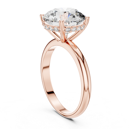 Rose gold round brilliant solitaire ring rear angle view
Rear angle of round brilliant diamond ring
Rose gold four prong solitaire ring profile
Round brilliant diamond ring with hidden halo
Rose gold hidden halo diamond ring
Lab grown round brilliant solitaire ring
Rose gold ring with hidden halo setting
Rear profile of round brilliant diamond ring
Rose gold polished solitaire ring
Four prong round brilliant engagement ring