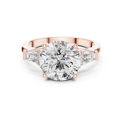 Rose gold round brilliant three stone ring
Round brilliant diamond ring with trapezoid side stones
Rose gold three stone engagement ring
Round brilliant diamond ring in rose gold
Rose gold ring with tapered side diamonds
Lab grown round brilliant three stone ring
Rose gold round center diamond ring
Three stone diamond ring with polished band
Round brilliant diamond ring with side stones
Classic three stone diamond ring