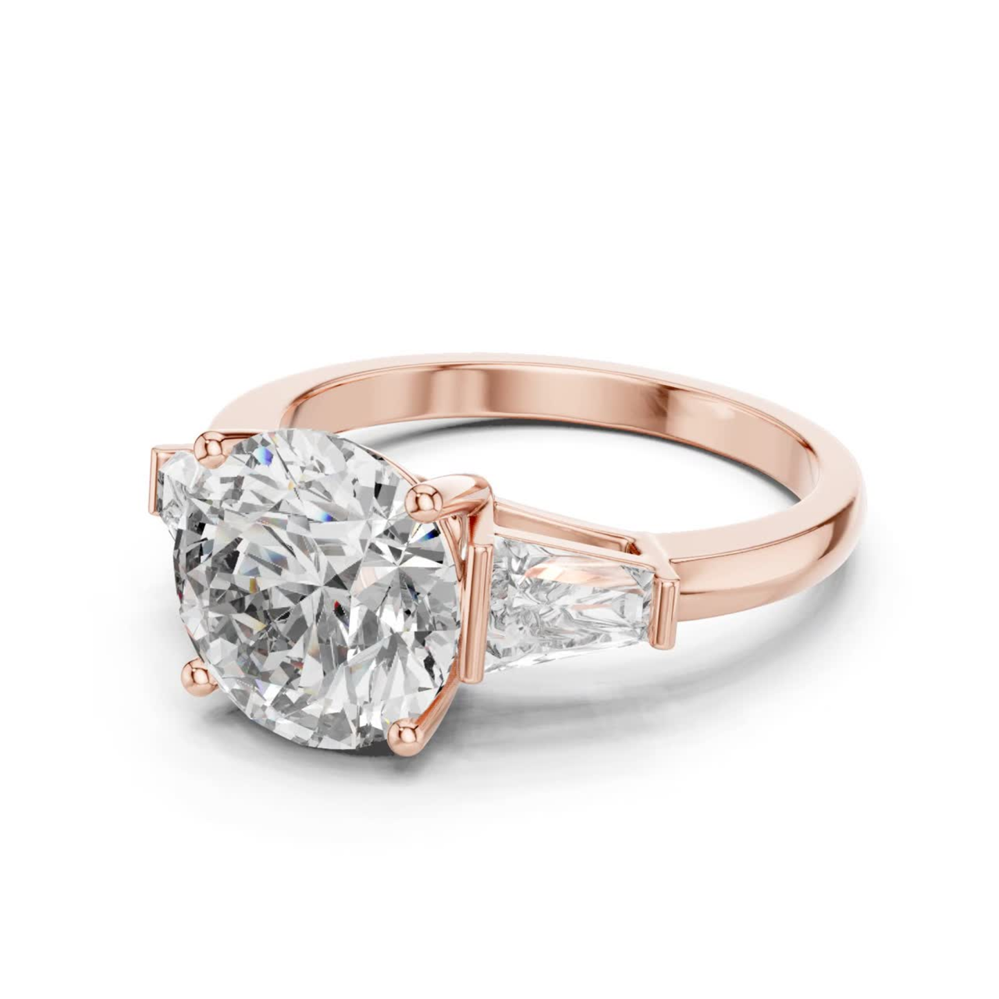 Rose gold round brilliant three stone ring angled view
Round brilliant diamond ring with trapezoid side stones
Rose gold three stone diamond engagement ring
Angled view of round brilliant three stone ring
Rose gold ring with tapered side diamonds
Lab grown round brilliant three stone ring
Rose gold round center diamond ring
Three stone diamond ring with polished band
Round brilliant diamond ring with side stones
Classic three stone engagement ring