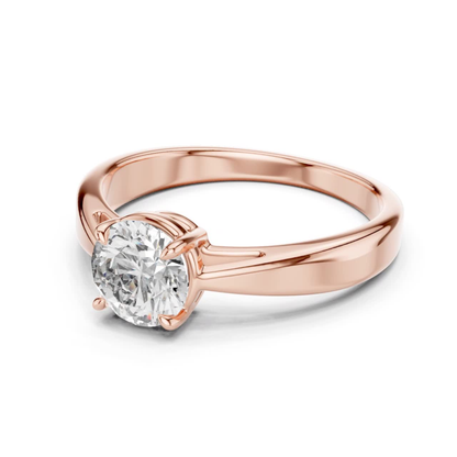 Rose gold round cut diamond ring angle view
Rose gold tapered band solitaire diamond ring
Angled rose gold round diamond engagement ring
Rose gold polished round diamond ring design
Round brilliant diamond ring with tapered shank
Rose gold four prong diamond ring angle
Rose gold elegant solitaire ring perspective
Rose gold classic round diamond ring profile
Rose gold minimal diamond ring side angle
Rose gold round diamond tapered band ring