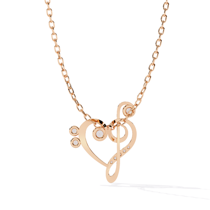 Rose gold heart music note pendant back view
Round diamond heart music pendant rear view
Back view of rose gold music pendant
Heart music note pendant reverse side
Rose gold diamond pendant back profile
Open heart music pendant back detail
Rear view of heart music note pendant
Rose gold heart pendant reverse design
Round diamond music pendant back view
Heart music note pendant back finish
