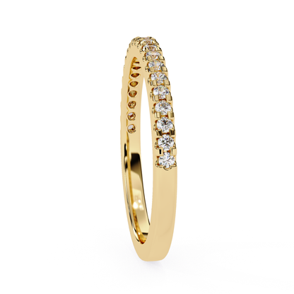 Side view of round diamond half eternity band in yellow gold
