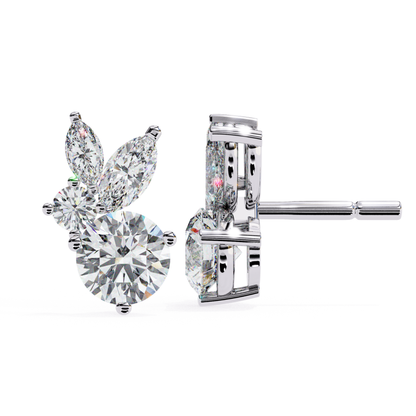 Charming white gold stud earrings with a radiant round diamond at the center, accented by marquise diamonds that enhance the brilliance and elegance.