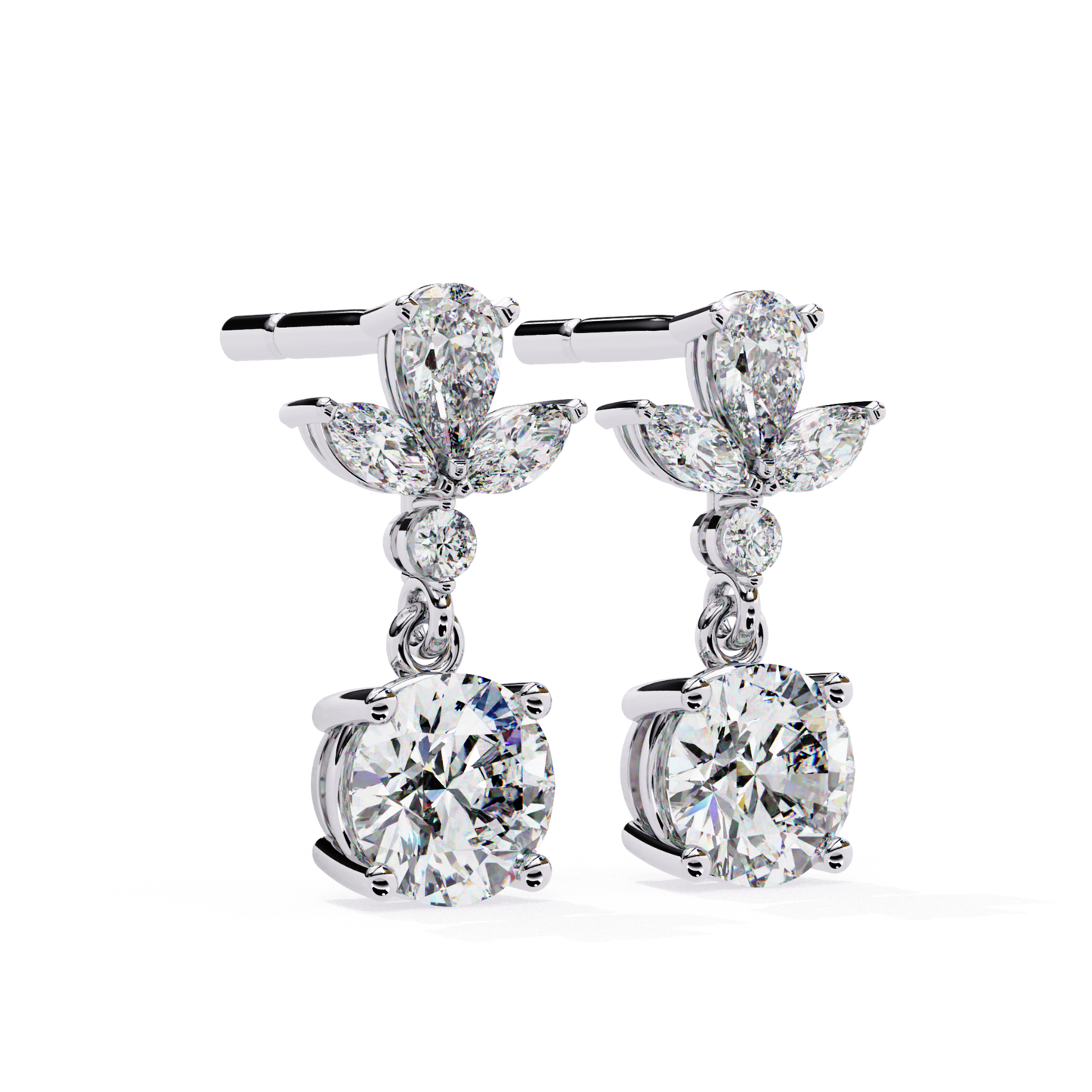Sophisticated white gold drop earrings featuring a brilliant round diamond, paired with pear-shaped diamonds in a leaf arrangement for a timeless, graceful look.