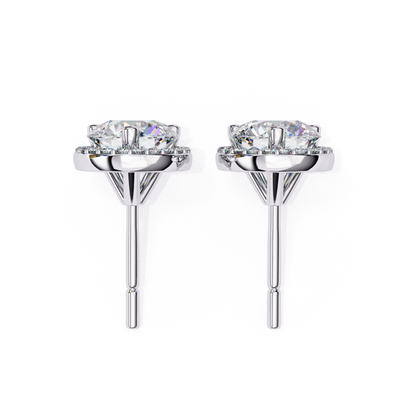Side profile of white gold round diamond stud earrings with halo setting