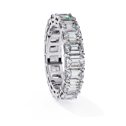 White gold emerald cut diamond eternity band
Emerald diamonds set in white gold band
White gold band with continuous diamonds
Close up of white gold diamond eternity band
Side view of white gold eternity band
Polished white gold band with diamonds
Top view of white gold eternity band
White gold band with alternating diamonds
Emerald diamonds in a white gold setting
Classic white gold eternity band with diamonds