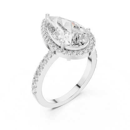 White gold pear diamond halo ring angled view
Angled view of white gold pear diamond halo ring
White gold pear cut diamond halo engagement ring
Pear solitaire diamond ring with halo setting
White gold pear diamond ring with pave band
Pear shaped halo ring in white gold
White gold pear lab grown diamond ring
White gold pear halo ring with diamond band
Angled white gold pear engagement ring
White gold pear halo diamond ring