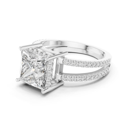 White gold princess diamond ring side angle view
Split shank white gold ring with princess cut diamond
Large princess cut diamond ring with pave band detail
White gold engagement ring with double split shank
Side view of princess diamond solitaire ring in white gold
Elegant white gold ring with pave accent diamond
Modern split band ring with elevated princess diamond
Fine white gold ring with four prong princess setting
Princess cut diamond ring with open gallery design
White gold ring with split pave shank