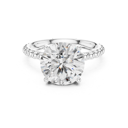 White gold round cut diamond beaded band ring
White gold solitaire ring with beaded shank
Round diamond ring with polished beaded band
Four prong round diamond white gold ring
White gold engagement ring with beaded detail
Classic round diamond ring in white gold
Beaded shank round solitaire diamond ring
Minimal white gold round diamond ring
Fine white gold ring with round diamond
Round brilliant diamond white gold ring