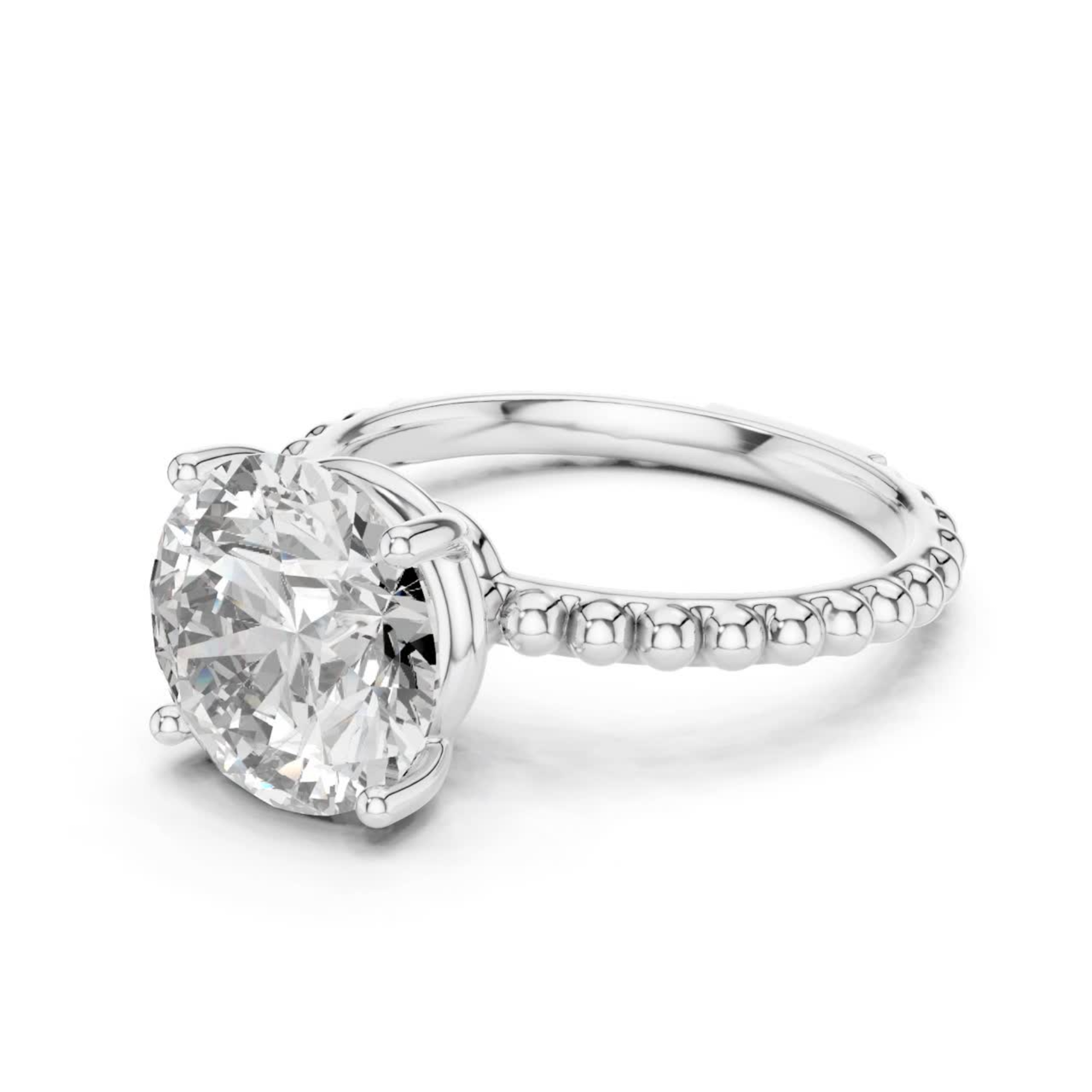 White gold round solitaire diamond front side view
Round cut diamond ring with beaded white band
Four prong round diamond solitaire white gold ring
White gold beaded band solitaire engagement ring
Angled view of round diamond white gold ring
White gold ring with raised round diamond
Round brilliant diamond beaded shank ring
White gold solitaire ring with polished beaded band
Front side angle round diamond engagement ring
White gold round diamond prong setting ring