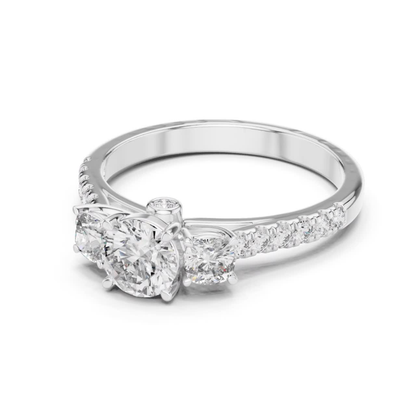 White gold three stone diamond ring side angle
Round diamond ring with white gold band view
White gold ring with three round diamonds
Side profile of white gold diamond ring
White gold diamond ring with pavé shank
Angled white gold three stone ring design
Round brilliant white gold diamond ring
White gold diamond ring with polished band
Classic white gold three diamond ring view
White gold round diamond engagement ring