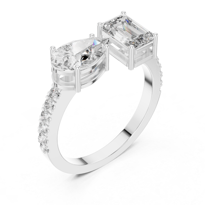 White gold toi et moi diamond ring angled view
Angled view of white gold toi et moi ring
White gold emerald cut and pear diamond ring
Pear and emerald cut diamond ring in white gold
White gold two stone diamond engagement ring
White gold dual diamond ring angled profile
Toi et moi ring with pear and emerald diamonds
White gold bypass ring with two diamonds
White gold pear and emerald diamond ring
White gold modern toi et moi diamond ring