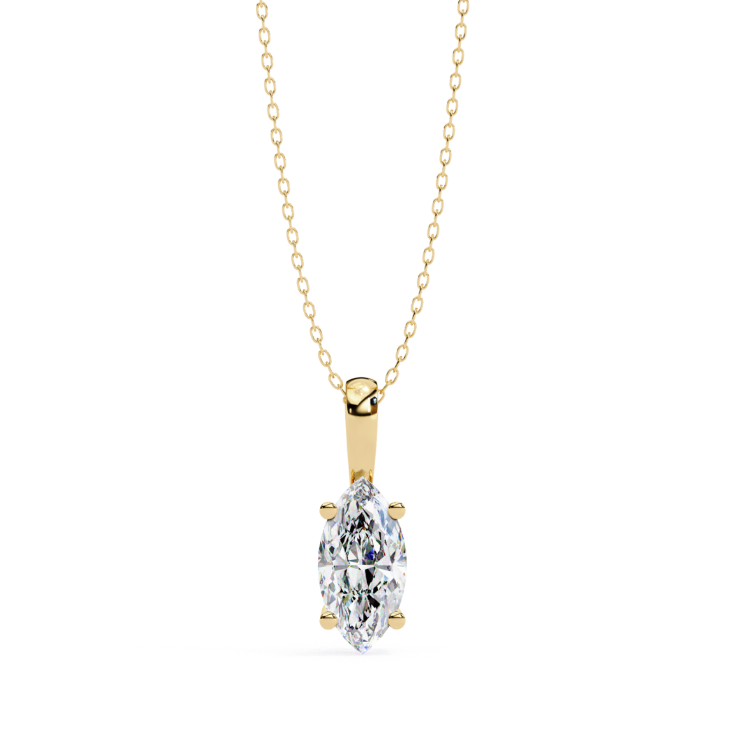 pendant with a pear-cut diamond set in yellow gold, hanging from a chain.