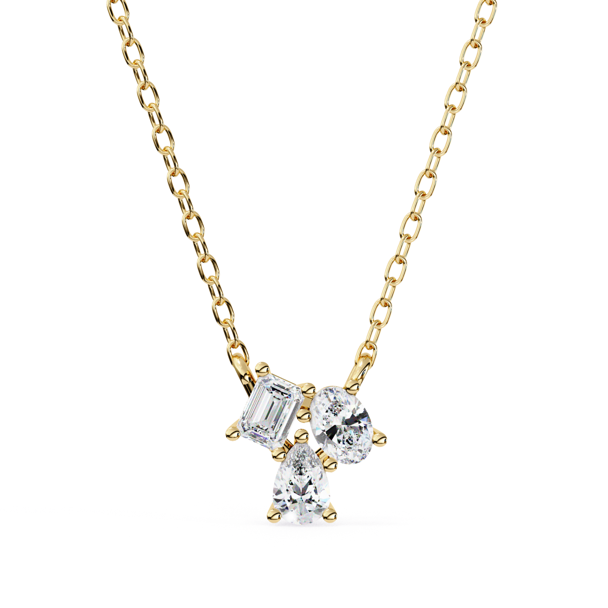 A necklace featuring emerald, oval, and pear-shaped diamonds set in yellow gold.
