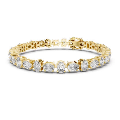 Yellow gold oval cut diamond tennis bracelet luxury jewelry
Classic oval diamond tennis bracelet in yellow gold
Elegant oval cut diamond bracelet for women
Yellow gold bracelet with sparkling oval diamonds
Fine jewelry oval diamond tennis bracelet design
Premium oval diamond bracelet in solid yellow gold
Designer oval cut diamond bracelet with prong setting
Modern yellow gold oval diamond bracelet jewelry
Timeless tennis bracelet featuring oval diamonds
Luxury yellow gold oval diamond bracelet gift