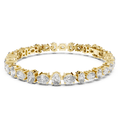 Yellow gold oval diamond tennis bracelet with prong setting
Luxury oval cut diamond bracelet in solid yellow gold
Elegant oval diamond tennis bracelet for women
Fine jewelry bracelet with brilliant oval diamonds
Classic yellow gold oval diamond bracelet design
Premium tennis bracelet featuring oval cut diamonds
Designer yellow gold bracelet with sparkling diamonds
Modern oval diamond bracelet with secure clasp
Statement oval diamond tennis bracelet jewelry
Handcrafted yellow gold oval diamond bracelet