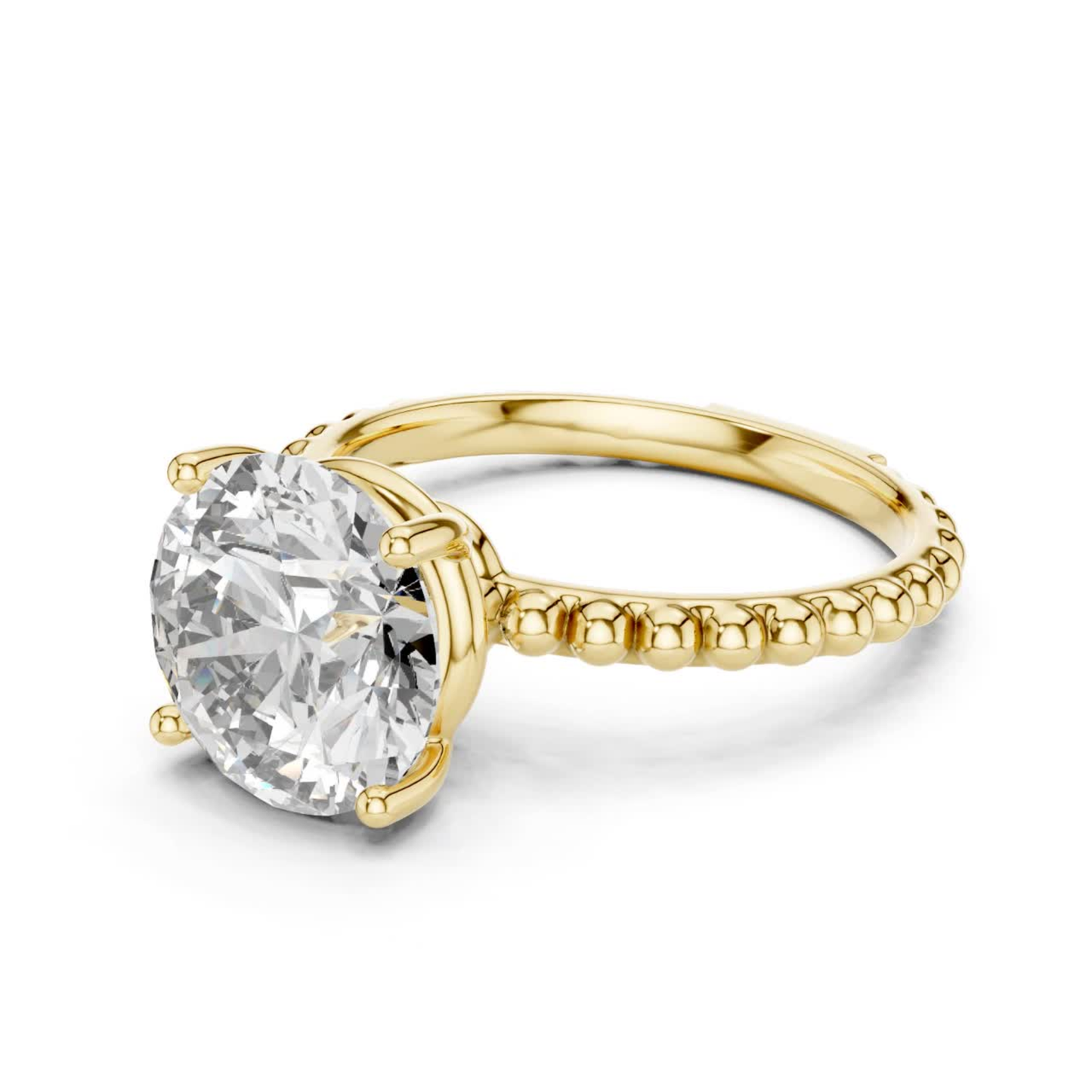 Yellow gold round solitaire diamond front side view
Round cut diamond ring with beaded gold band
Four prong round diamond solitaire gold ring
Yellow gold beaded band solitaire engagement ring
Angled view of round diamond gold ring
Yellow gold ring with raised round diamond
Round brilliant diamond beaded shank ring
Gold solitaire ring with polished beaded band
Front side angle round diamond engagement ring
Yellow gold round diamond prong setting ring