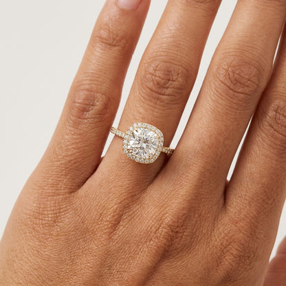 Lab grown cushion cut diamond halo engagement ring in 14K yellow gold
Cushion center diamond framed by a micro-pavé round halo
Yellow gold pavé-set band with matched accent diamonds
IGI certified cushion cut diamond halo ring, front view