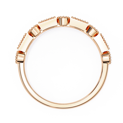  Close-up of rose gold band ring showing smooth curves